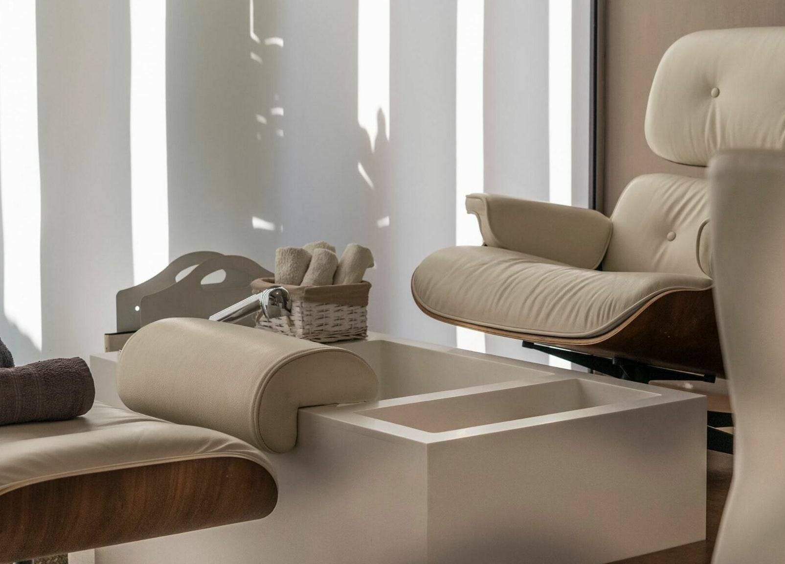 Relaxing pedicure chairs at Suenso Spa, Limassol, Limassol, CY, bathed in natural light.