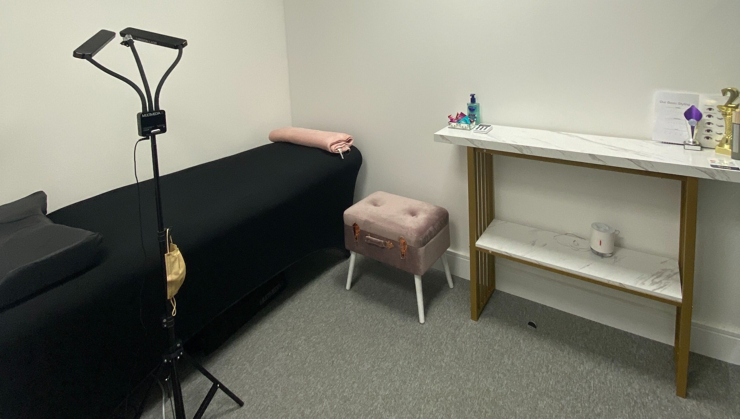 Serene spa room at Blink PN Lash, London, England, GB with soothing decor and treatment bed.