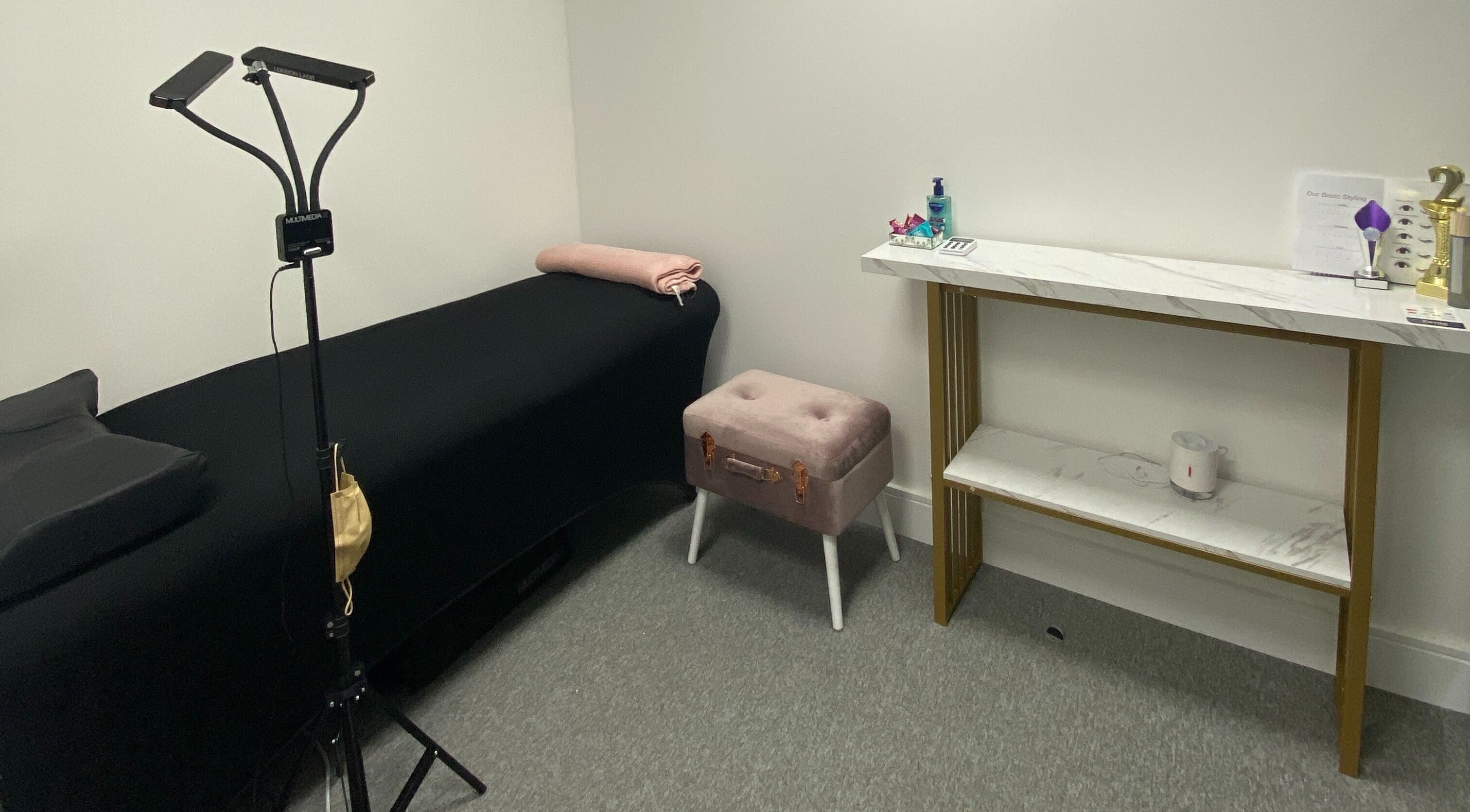 Serene spa room at Blink PN Lash, London, England, GB with soothing decor and treatment bed.