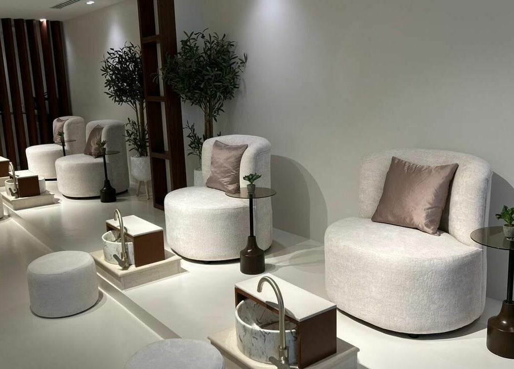 Elegant pedicure chairs at Noor Beauty Salon, Dammam, Eastern Province, SA, offering a relaxing atmosphere.