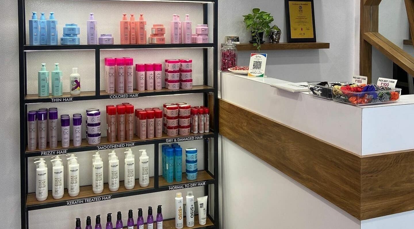 Shelves of hair care products at Hair Castle - Dombivali, offering diverse treatments. Location: Dombivli, Maharashtra, IN.