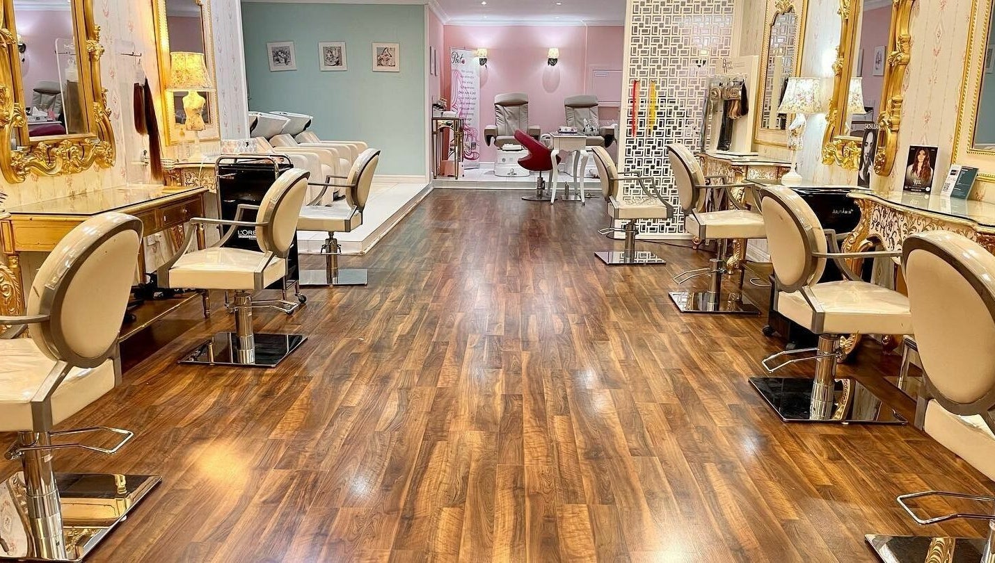 Inside Pout Salon and Spa, Dubai, AE: luxurious styling chairs, elegant decor with warm lighting.