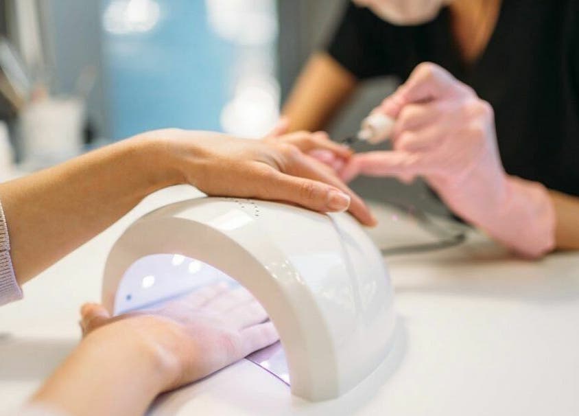 Professional gel manicure service at Pout Salon and Spa in Dubai, AE, enhancing nail beauty and care.