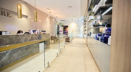 Reception area at Lumiere Cosmetic Clinic, Haymarket, New South Wales, AU showcasing modern design.