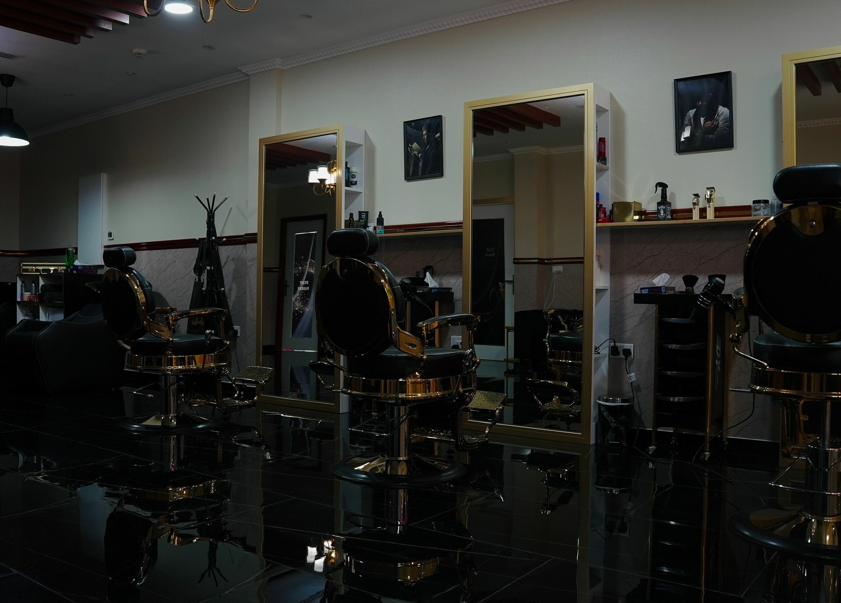 A stylish interior of The Sharp Edge Gents Salon in Dubai, Dubai, AE, featuring sleek barber chairs and mirrors.