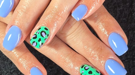 Vibrant blue and leopard print nail art at Fenn Estetika Permanent Makeup & Aesthetics, Pretoria, Gauteng, ZA.
