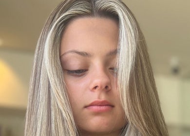 Stylish blonde hair at Valori Hair salon in Melbourne, Victoria, AU, showcasing sleek highlights.