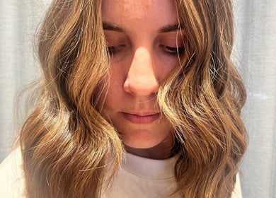 Close-up of styled wavy hair in soft curls at Valori Hair, Melbourne, Victoria, AU.