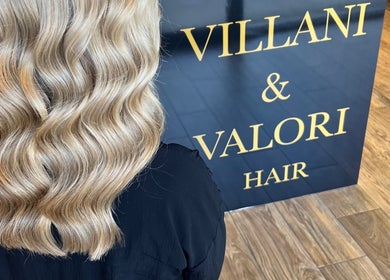Blonde wavy hairstyle at Valori Hair, Melbourne, Victoria, AU showcasing elegant salon ambiance.