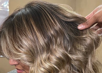 Stunning golden hairstyle at Cpt Hairn, Cape Town, Western Cape, ZA, showcasing expert salon styling.
