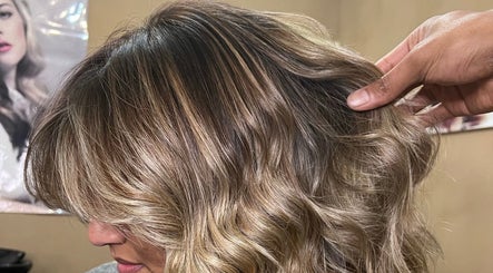Stunning golden hairstyle at Cpt Hairn, Cape Town, Western Cape, ZA, showcasing expert salon styling.