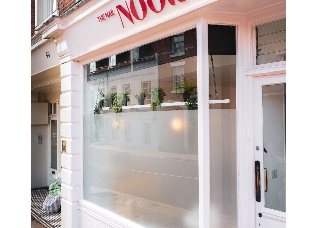 Storefront of Maisy Does Manis in Shrewsbury, England, GB, featuring elegant window displays.