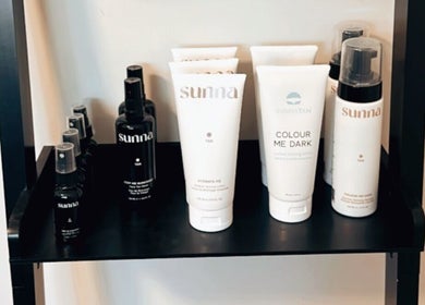 Sunna tanning products on a shelf at Afterglow Airbrush Studio, Nanaimo, British Columbia, CA.