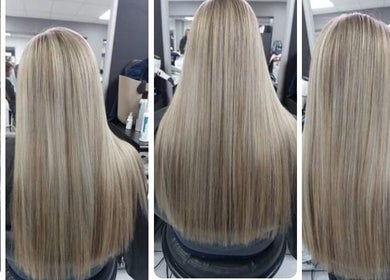 Sleek blonde hair at Carla Wernars Hairdressing in Alberton, Gauteng, ZA, showcasing expert styling.