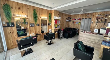 Interior of VIP Healthy Hair, Muang Pattaya, Chon Buri, featuring wooden decor and styling chairs.