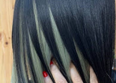 Stylish hair with black and blonde highlights at VIP Healthy Hair, Muang Pattaya, Chon Buri, TH.