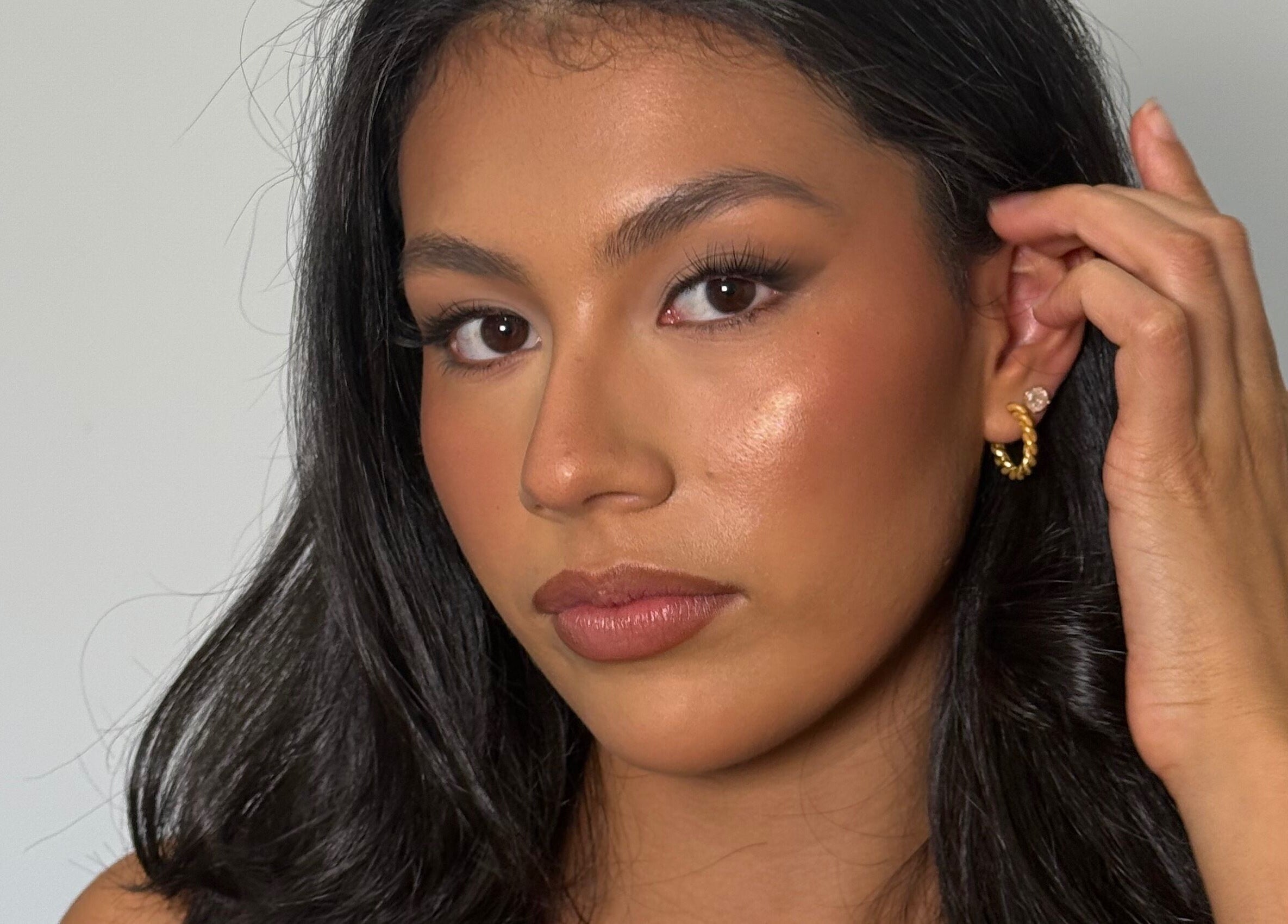 Close-up of a woman with radiant makeup at Faces By Jana, Melbourne, Victoria, AU.