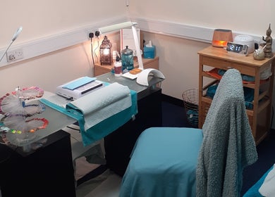 Elegant treatment room at The Nook, Ellesmere Port, England, GB, with soothing decor and beauty equipment.
