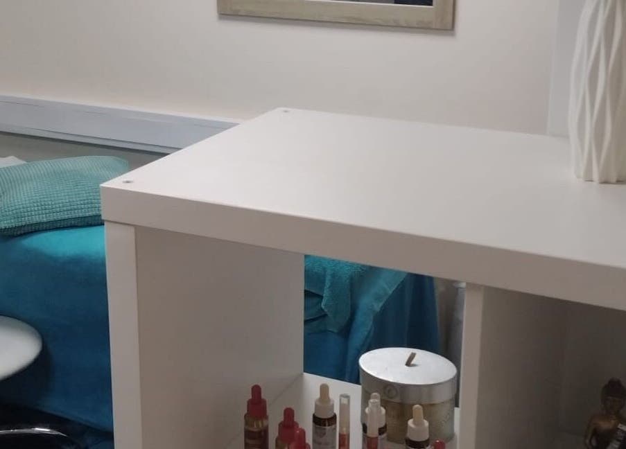 Tranquil treatment room at The Nook, Ellesmere Port, England, GB featuring a relaxing bed and soothing decor.