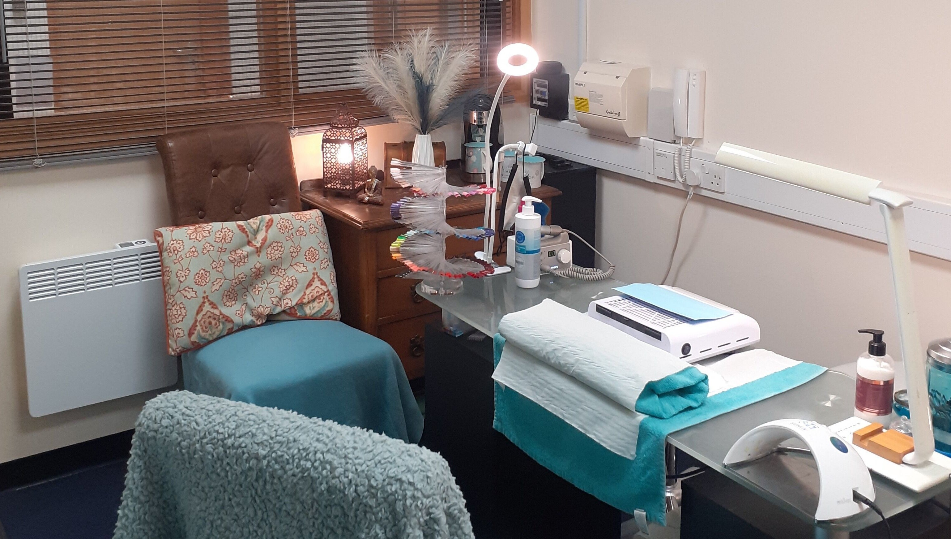 Cozy nail corner at The Nook, Ellesmere Port, England, GB featuring elegant decor and salon equipment.