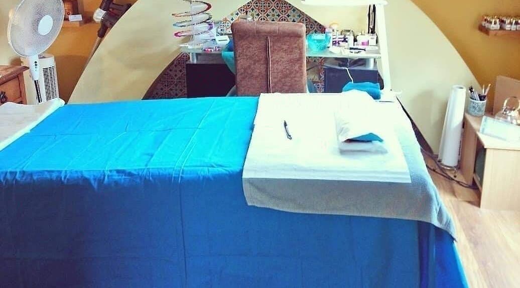 Cozy therapy room at The Nook in Ellesmere Port, England, GB with massage table and soothing colors.