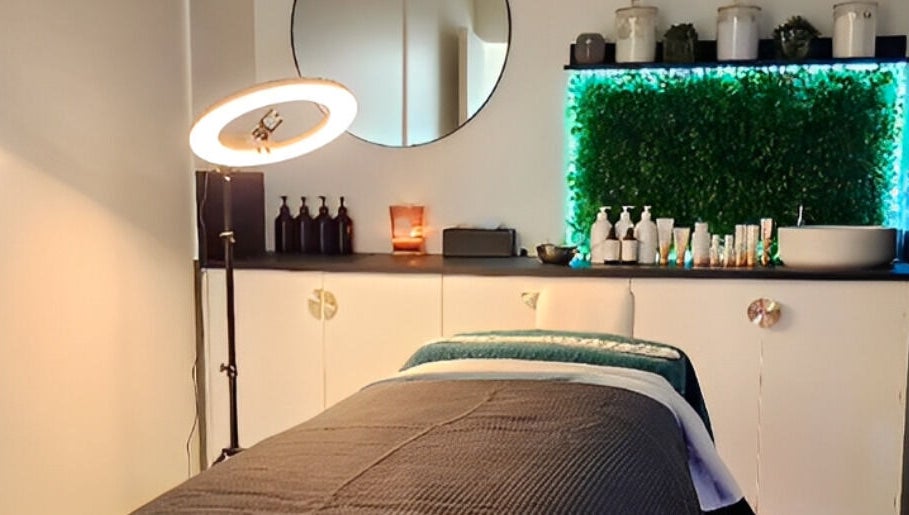 Tranquil spa room at Beauty by Manola in Bayview, Northern Territory, AU featuring a cozy treatment bed and lush decor.