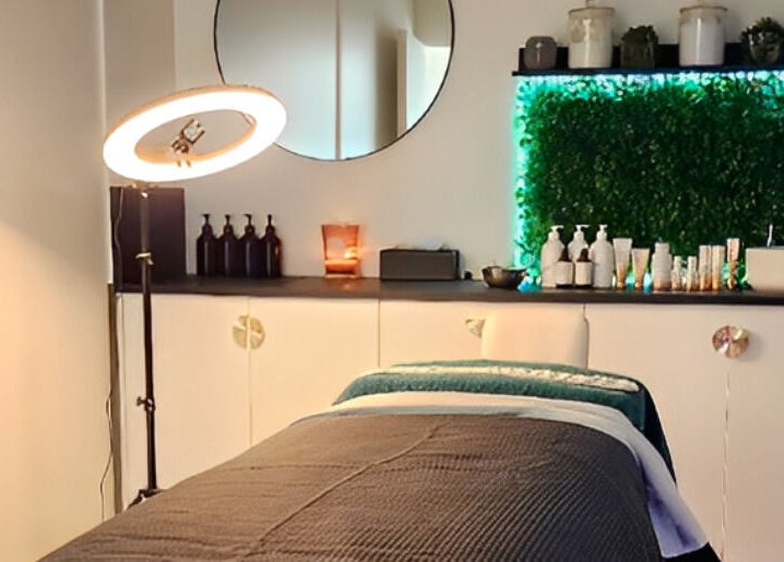 Tranquil spa room at Beauty by Manola in Bayview, Northern Territory, AU featuring a cozy treatment bed and lush decor.