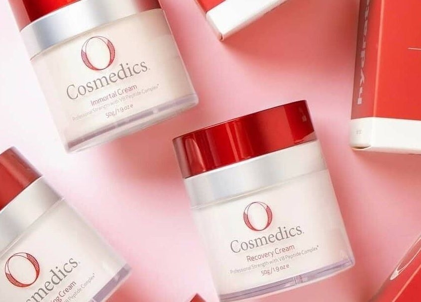 Cosmetics displayed at Beauty by Manola, Bayview, Northern Territory, AU. Elegant red and white packaging.