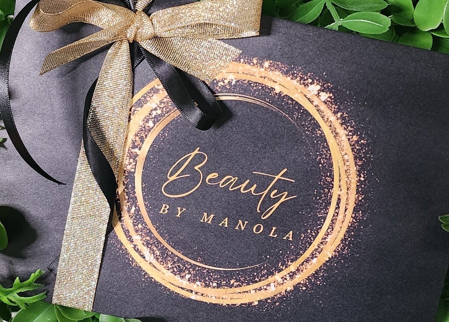 Beauty by Manola gift card with gold ribbon, Bayview, Northern Territory, AU.