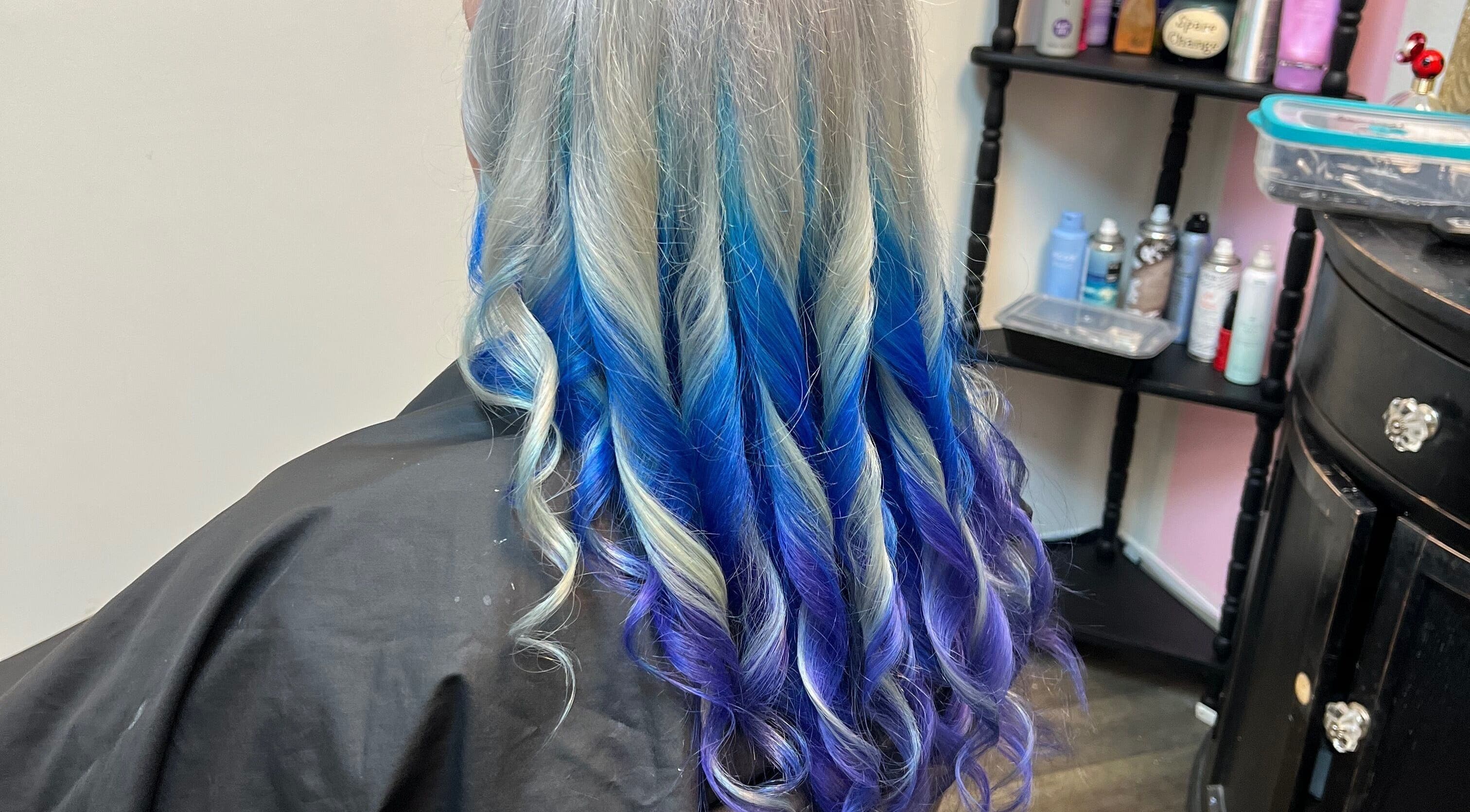Bright blue and silver curls styled at Denise’s Hair Creations, Hinesville, Georgia, US.