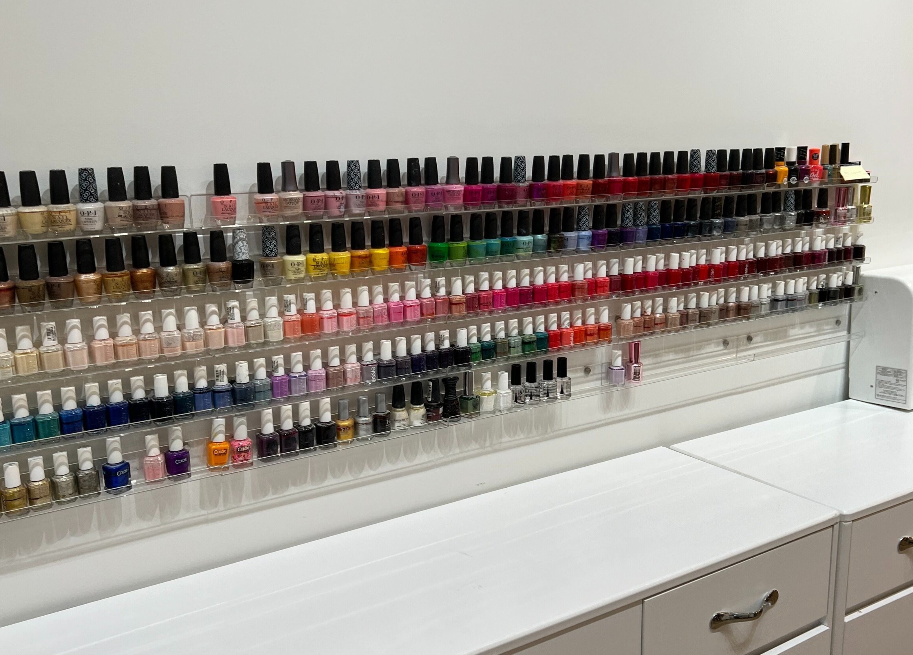 Variety of nail polishes displayed at M&M Studio NYC, New York, New York, US.