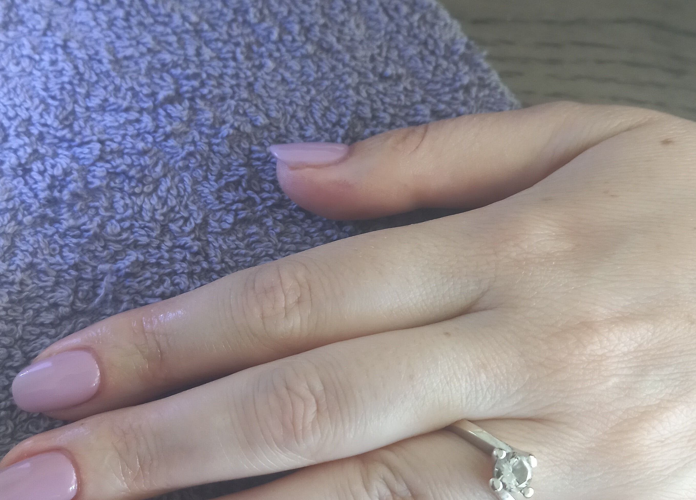 Elegant manicure with pale pink polish at Thobs and Cleo Beauty Bar, Johannesburg, Gauteng, ZA.