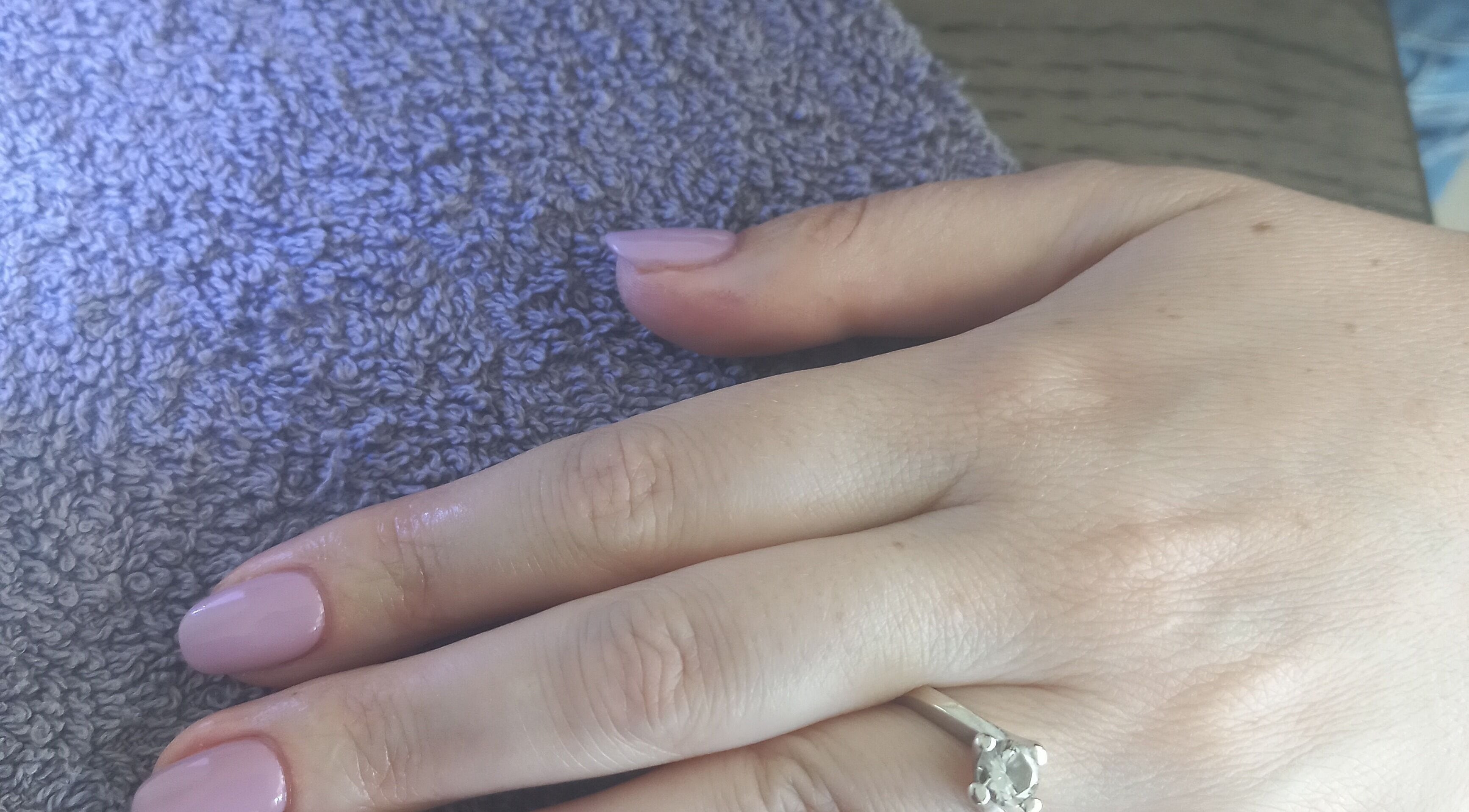 Elegant manicure with pale pink polish at Thobs and Cleo Beauty Bar, Johannesburg, Gauteng, ZA.