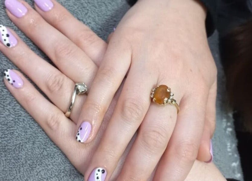 Pastel nail art with polka dots at Thobs and Cleo Beauty Bar, Johannesburg, Gauteng, ZA.