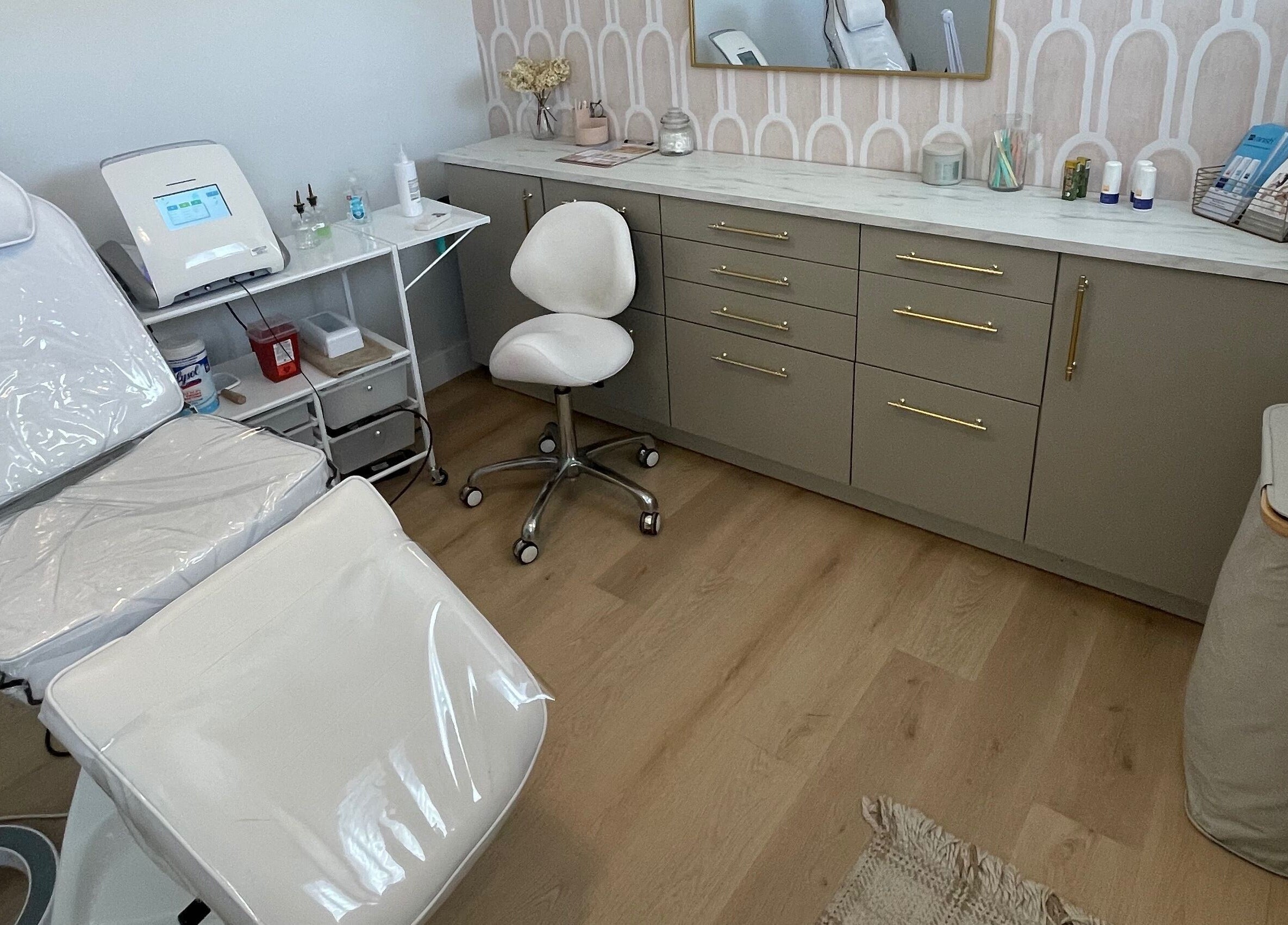Modern electrolysis room at Silk Electrolysis, Herriman, Utah, US, featuring a comfortable chair and sleek decor.
