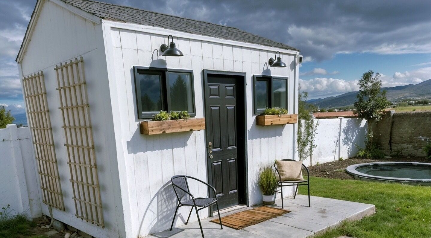 Cozy outdoor view of Silk Electrolysis in Herriman, Utah, with chairs, small garden, and scenic backdrop.