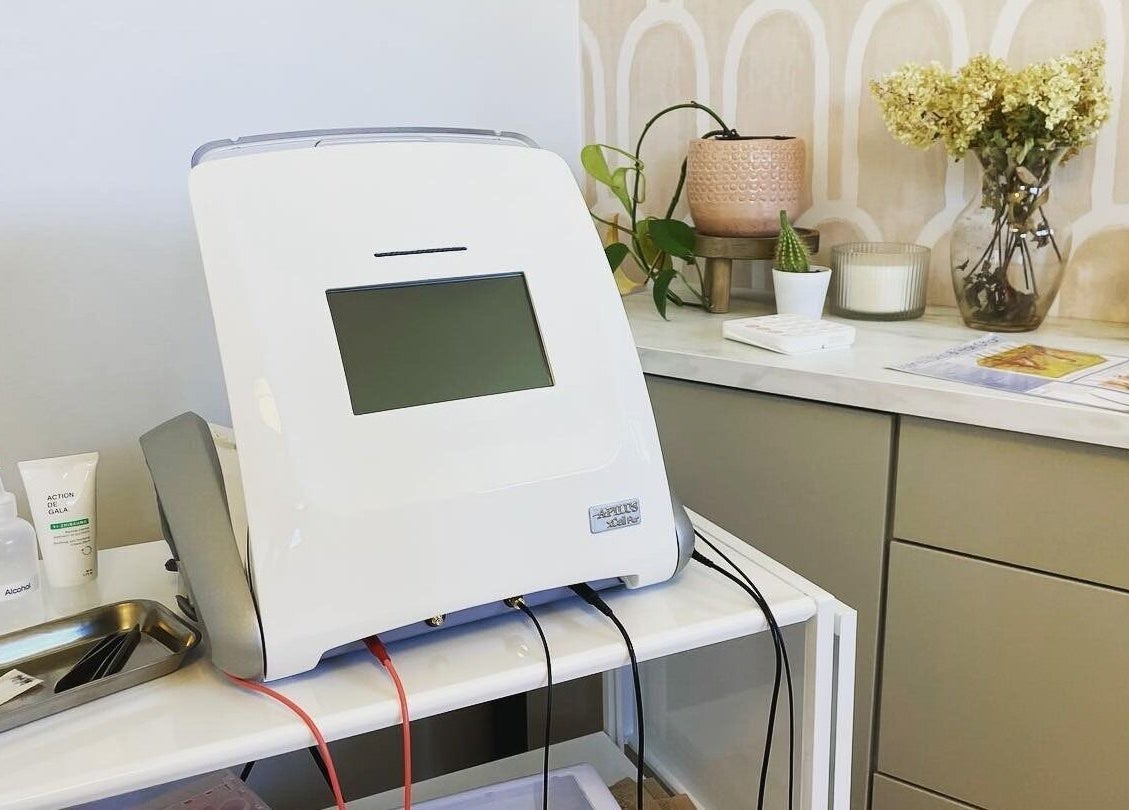 Modern electrolysis equipment at Silk Electrolysis in Herriman, Utah, US, featuring a sleek white design.