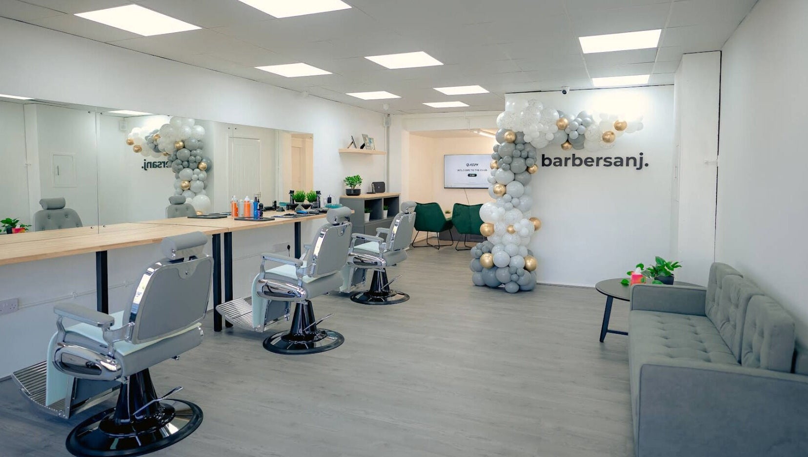 Modern interior of Barbersanj in Willenhall, England, featuring stylish chairs and decor for a premium grooming experience.