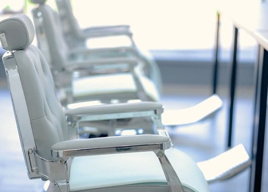 Sleek barber chairs at Barbersanj, Willenhall, England, GB highlighting modern design and comfort.