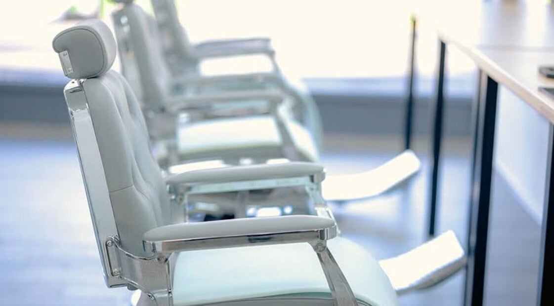 Sleek barber chairs at Barbersanj, Willenhall, England, GB highlighting modern design and comfort.
