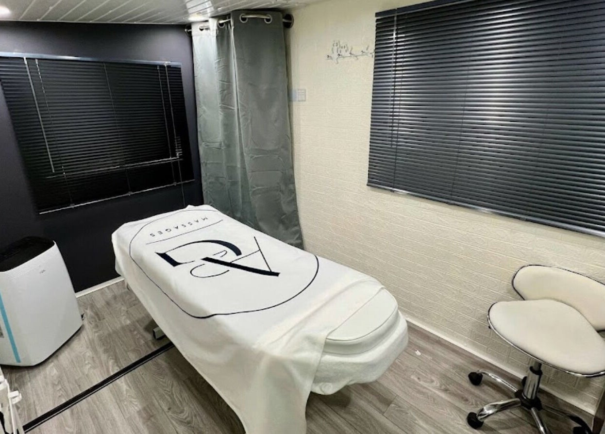 Tranquil massage room at AG Massages in Ash Vale, England, GB with massage table and modern decor.