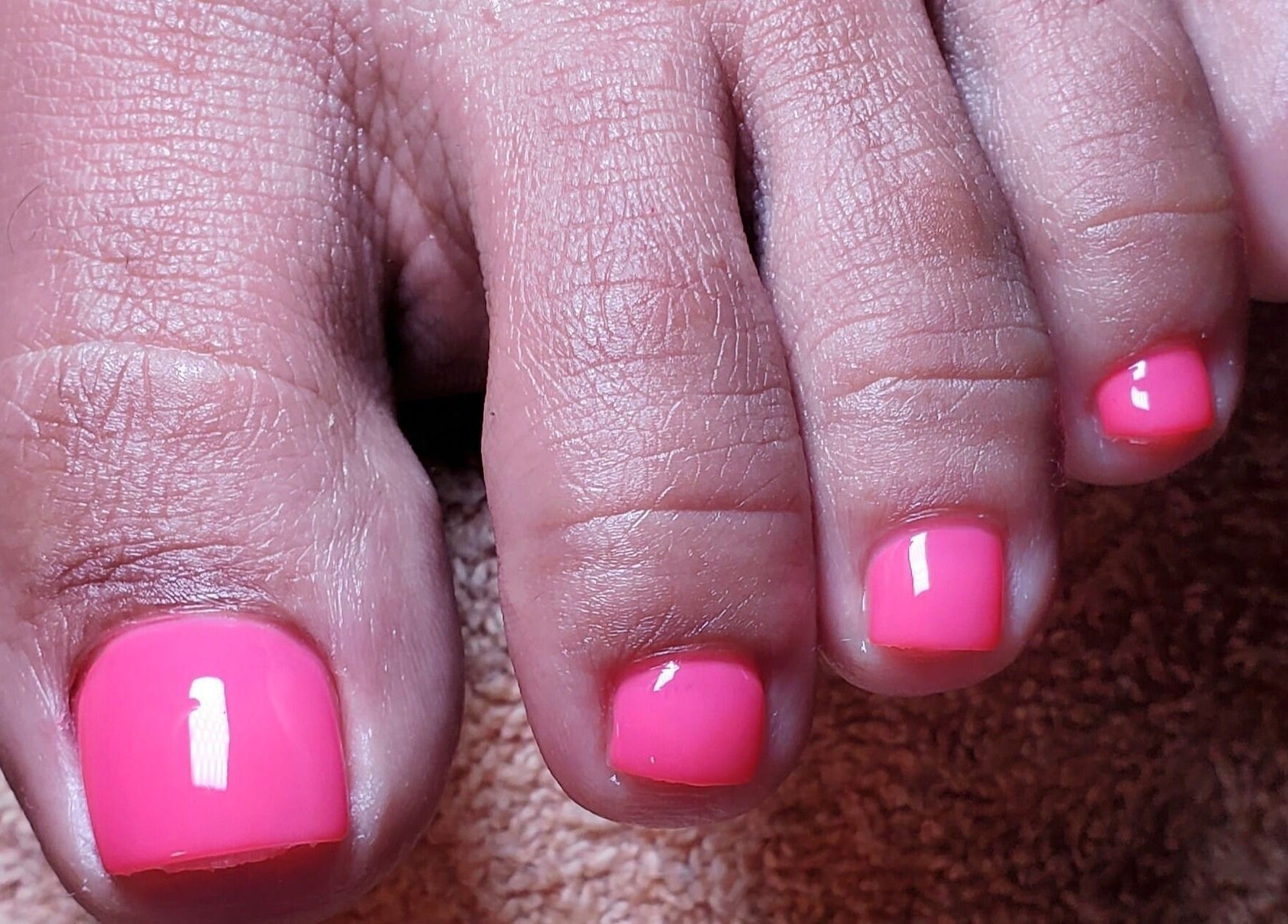 Lustrous hot pink pedicure at Totally Embellished Day Spa, Tunapuna, Tunapuna/Piarco Regional Corporation, TT.