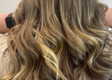 Stylish wavy golden hair at Obsessed - Hair By Michelle, Rotorua, Bay Of Plenty, NZ.