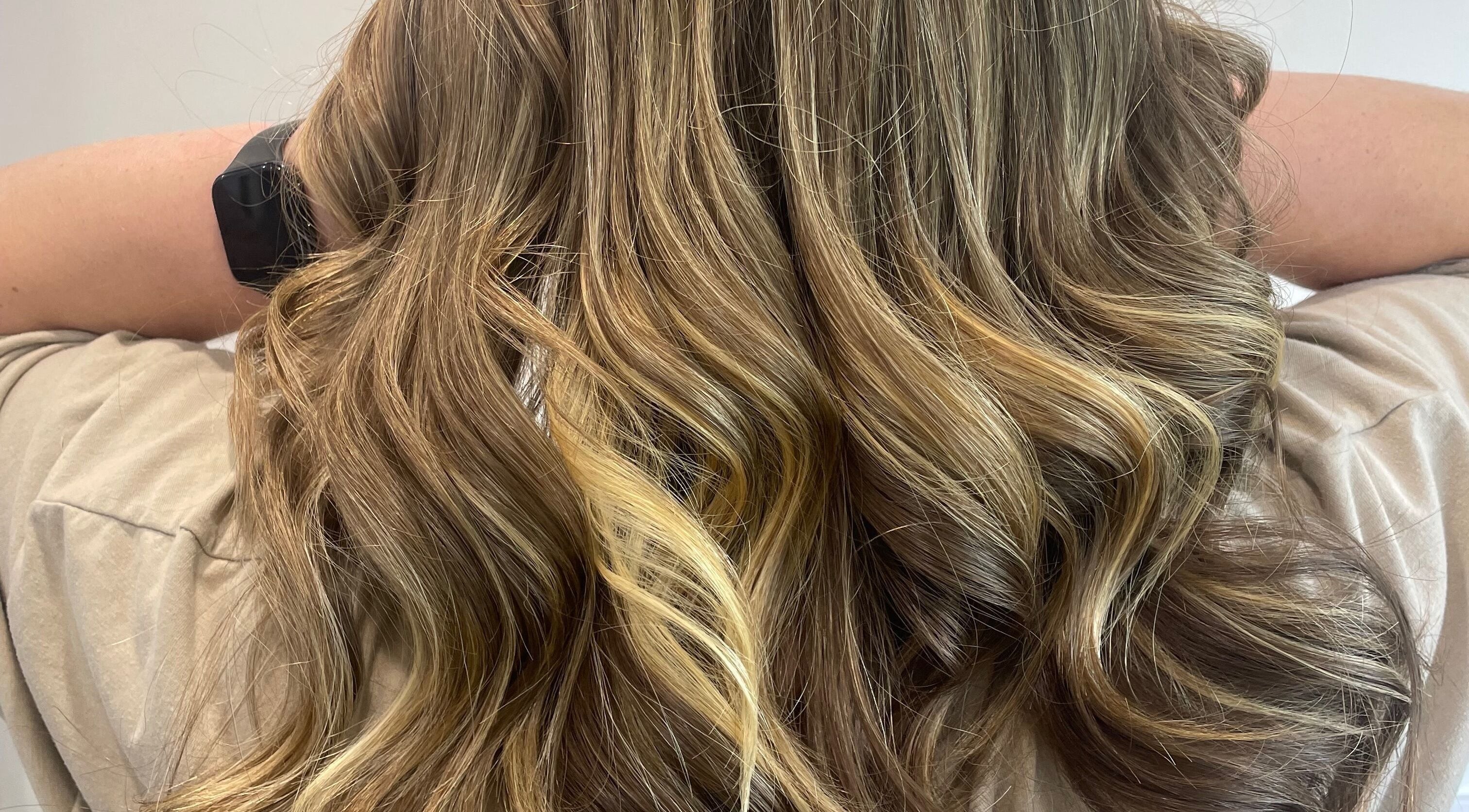 Stylish wavy golden hair at Obsessed - Hair By Michelle, Rotorua, Bay Of Plenty, NZ.