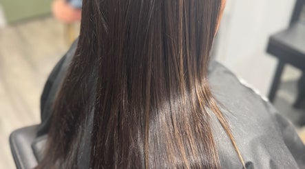 Lustrous long hair styled at Obsessed - Hair By Michelle, Rotorua, Bay Of Plenty, NZ, showcasing smooth textures.