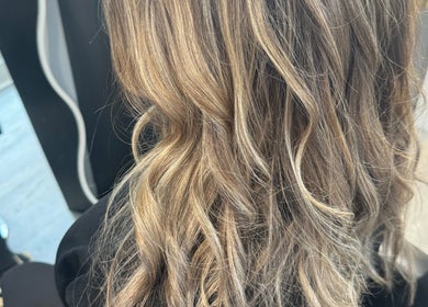 Blonde wavy hairstyle at Obsessed - Hair By Michelle, Rotorua, Bay Of Plenty, NZ.