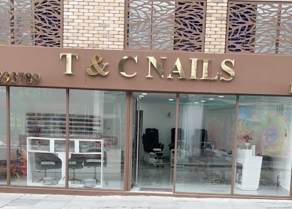 T & C Nails entrance with stylish facade, located in London, England, GB.