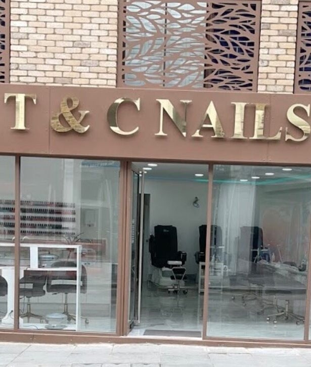 T & C Nails entrance with stylish facade, located in London, England, GB.