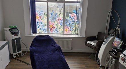 Treatment room with floral window at Wild Jasmine Retreat, Ramsbottom, England, GB.