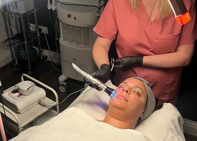 Facial treatment at Wild Jasmine Retreat in Ramsbottom, England, GB, highlighting expert care and advanced equipment.